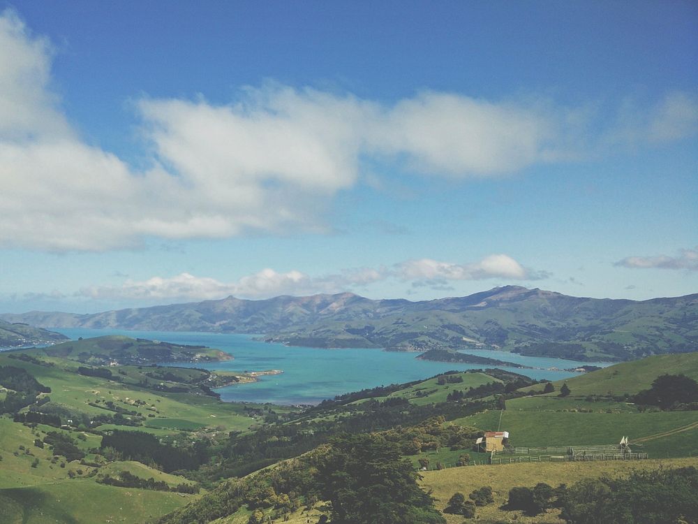 Aerial landscape view of the Akaroa village grassland. Original public domain image from Wikimedia Commons