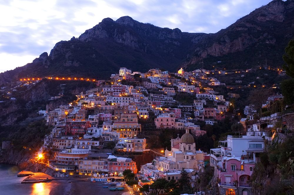 The small town on the side of a mountain in Positano, Italy. Original public domain image from Wikimedia Commons