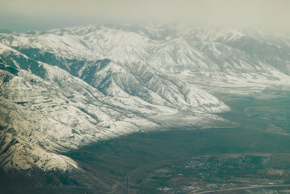 Snow-covered mountains near the Salt Lake City airport. Original public domain image from Wikimedia Commons