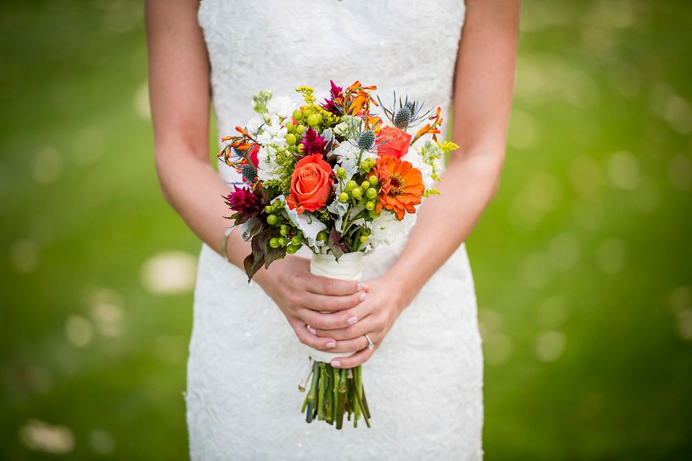 Bride with bouquet. Original public domain image from Wikimedia Commons