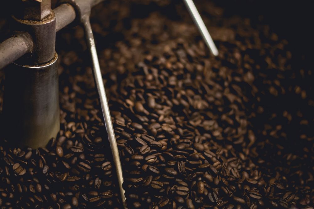 Coffee beans in a machine. Original public domain image from Wikimedia Commons