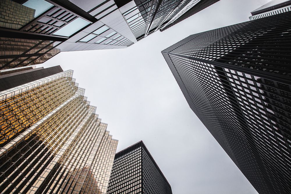 A low-angle shot of several distinct skyscraper facades in Toronto. Original public domain image from Wikimedia Commons