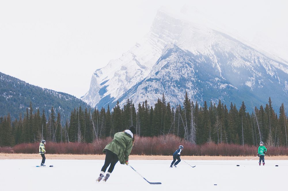 Children playing ice hockey in Banff National Park. Original public domain image from Wikimedia Commons