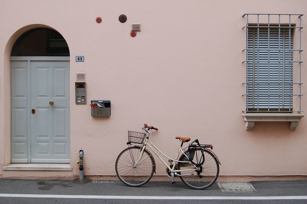 Parked bicycle with basket. Original public domain image from Wikimedia Commons