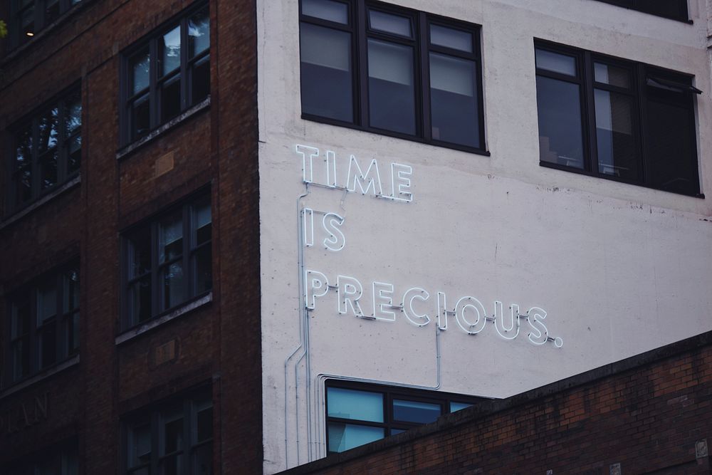 Led light text on building facade.Original public domain image from Wikimedia Commons