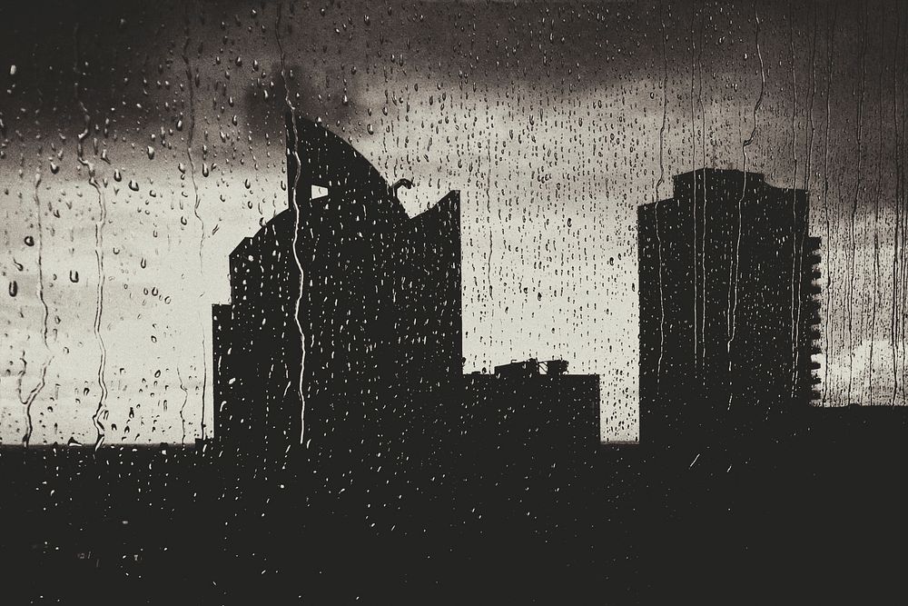 Raindrop on window, dark city background. Original public domain image from Wikimedia Commons