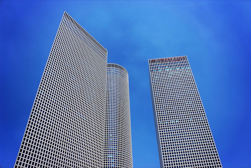 Skyscraper windows with sky. Original public domain image from Wikimedia Commons
