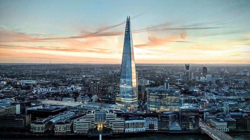 The Shard skyscraper against the skyline of London during sunset. Original public domain image from Wikimedia Commons