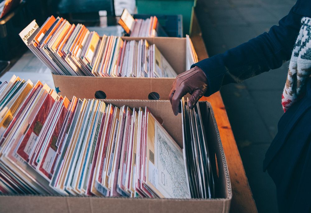 Sifting through record albums in boxes at Southbank Centre. Original public domain image from Wikimedia Commons