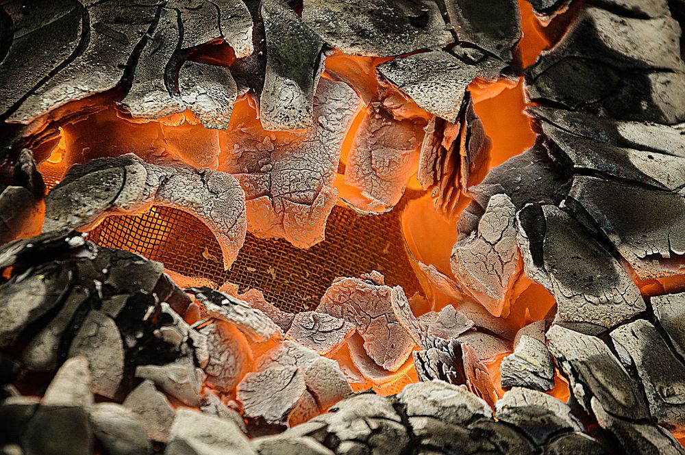 Burning coal close up background. Original public domain image from Wikimedia Commons