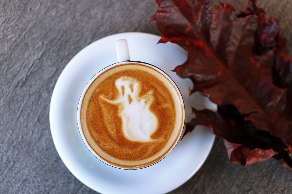 Coffee and autumn leaf. Original public domain image from Wikimedia Commons