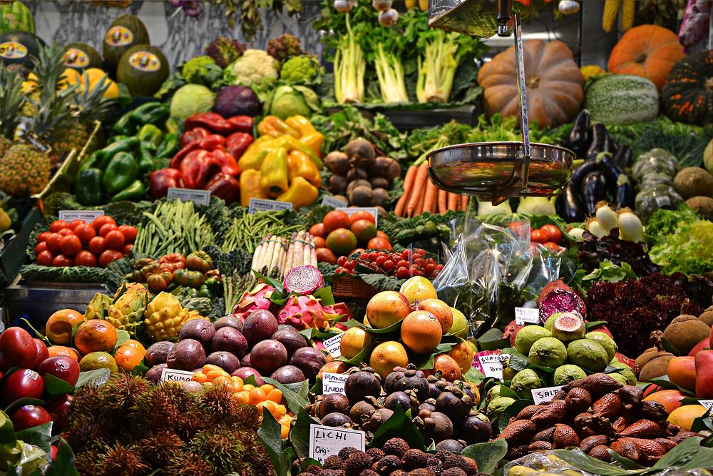 Colorful fruit and vegetables on a market stall. Original public domain image from Wikimedia Commons