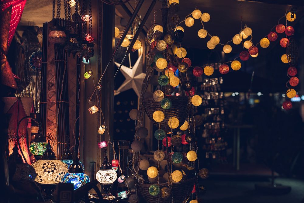 Christmas lights & colorful lamps in shop. Original public domain image from Wikimedia Commons