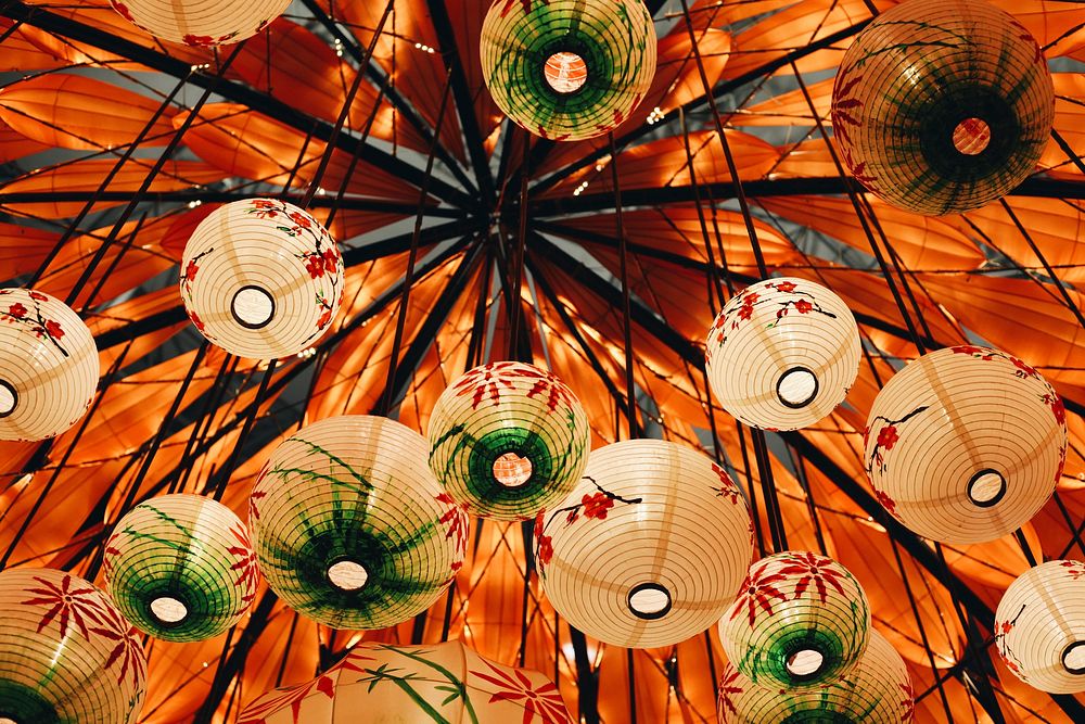 Colorful paper lanterns hanging from a ceiling. Original public domain image from Wikimedia Commons