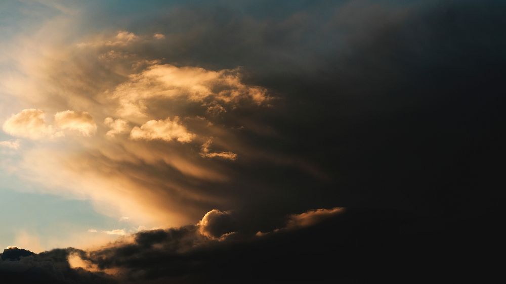 A dramatic cloudy sky during golden hour. Original public domain image from Wikimedia Commons