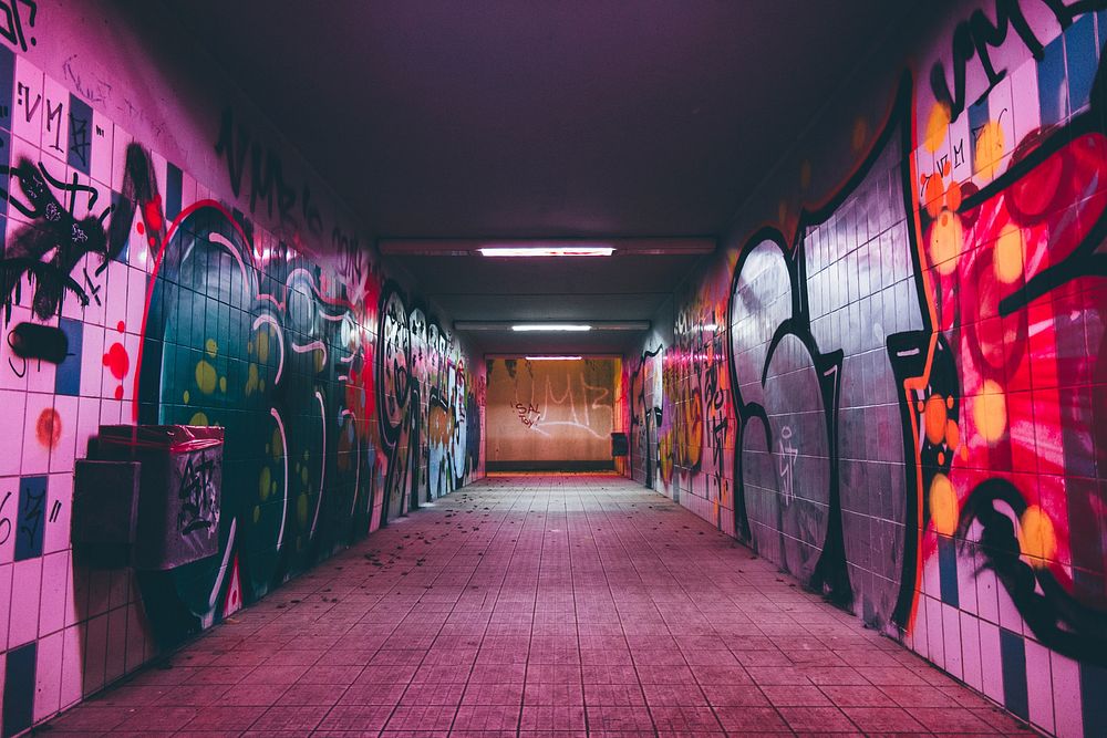 Graffiti art on wall in a tunnel. Original public domain image from Wikimedia Commons