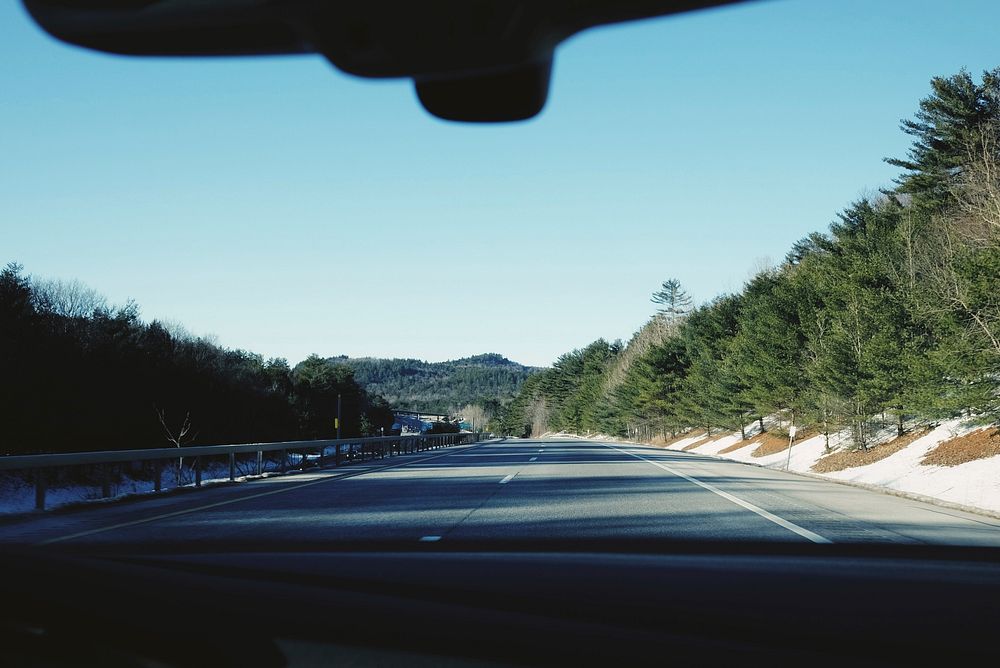 Grey road on car front view. Original public domain image from Wikimedia Commons