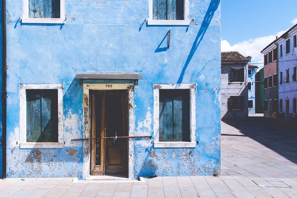 Weathered home exterior on Burano Island, Venice, Italy. Original public domain image from Wikimedia Commons