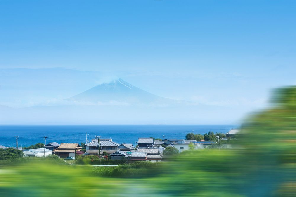 Clustered houses near ocean across Mt. Fuji. Original public domain image from Wikimedia Commons