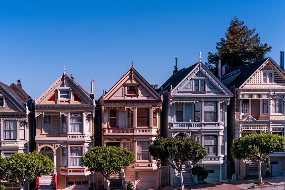 Five three-story houses in-lined on street. Original public domain image from Wikimedia Commons