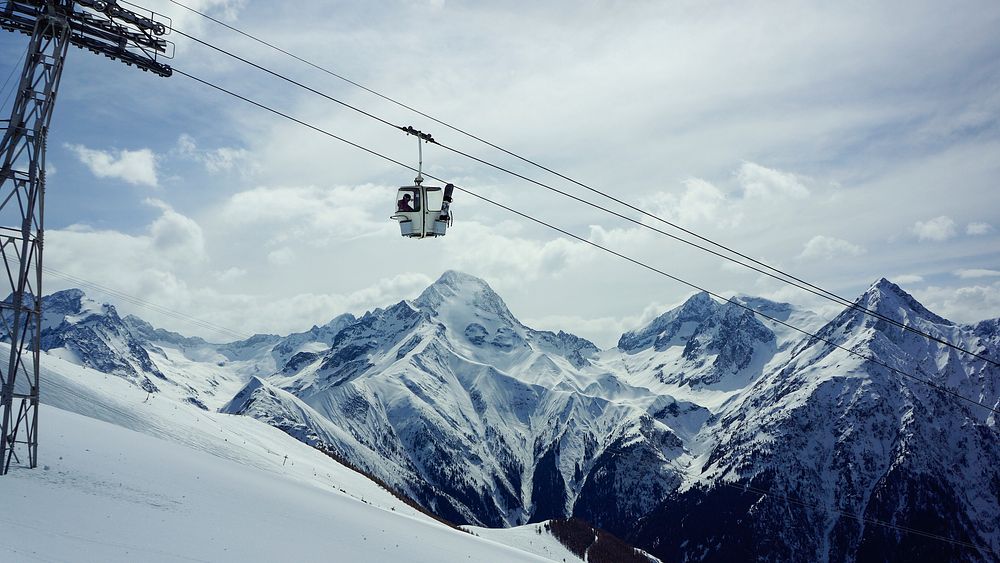 A chairlift in the mountains. Original public domain image from Wikimedia Commons