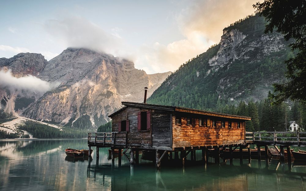 Cabin on Lago di Braies reflects in the still waters. Original public domain image from Wikimedia Commons