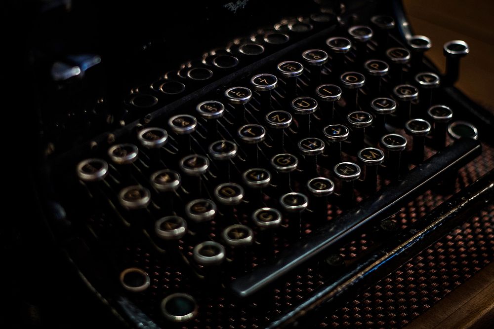 Vintage black typewriter. Original public domain image from Wikimedia Commons