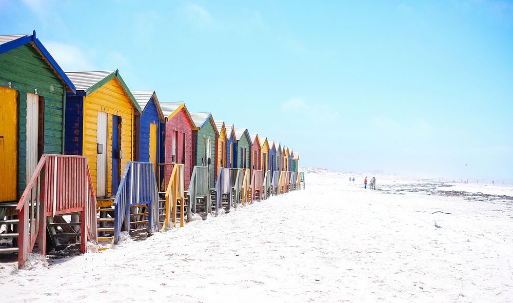 Colorful beach huts on a white sand beach in Muizenberg. Original public domain image from Wikimedia Commons