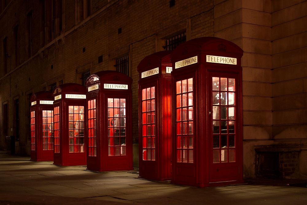 Red Telephone Booths Sidewalk. Original public domain image from Wikimedia Commons