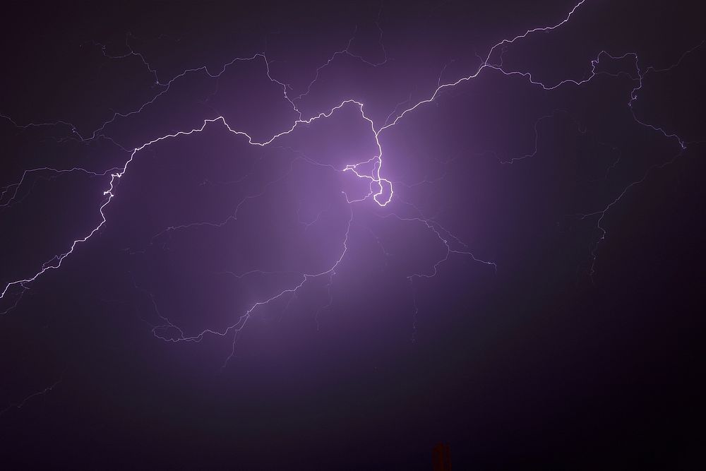 Lightning during nighttime. Original public domain image from Wikimedia Commons