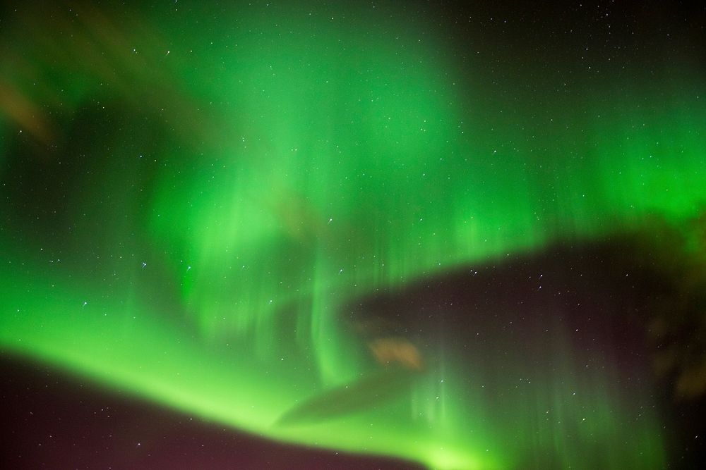 Aurora lights in Hamrar, Akureyri, Iceland. Original public domain image from Wikimedia Commons