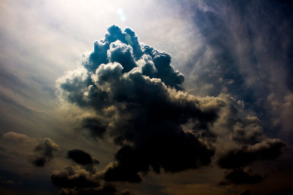 Dark clouds in the sky. Original public domain image from Wikimedia Commons