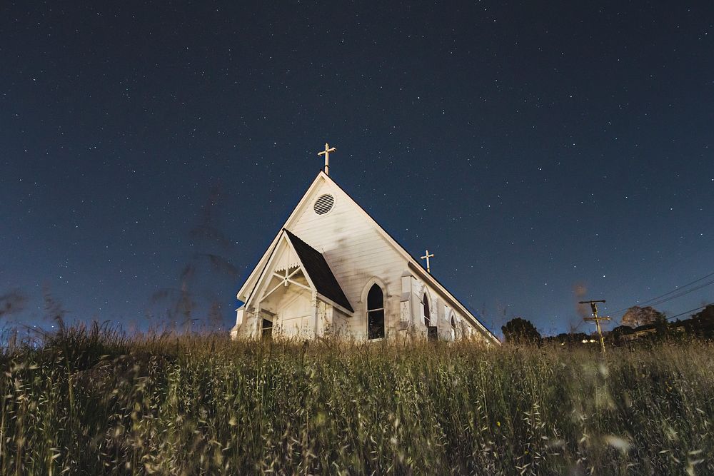 White church in the field during night time. Original public domain image from Wikimedia Commons
