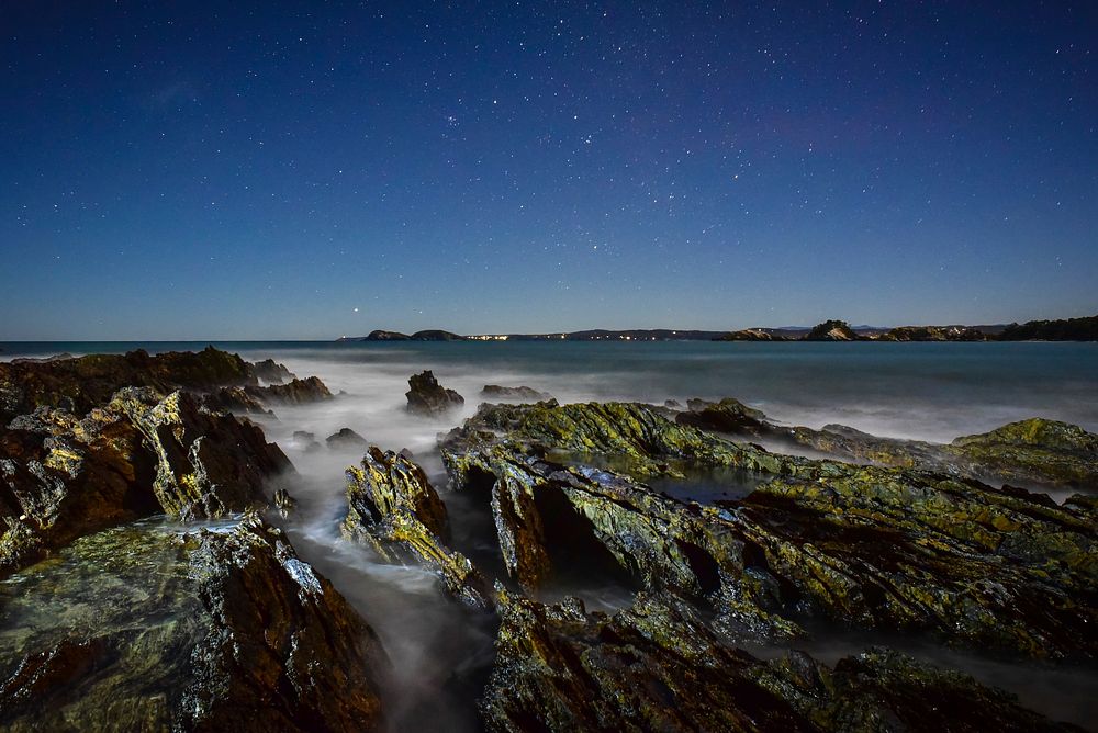 A look at the ocean near North Head Camp in the early night under a starlit sky. Original public domain image from Wikimedia…