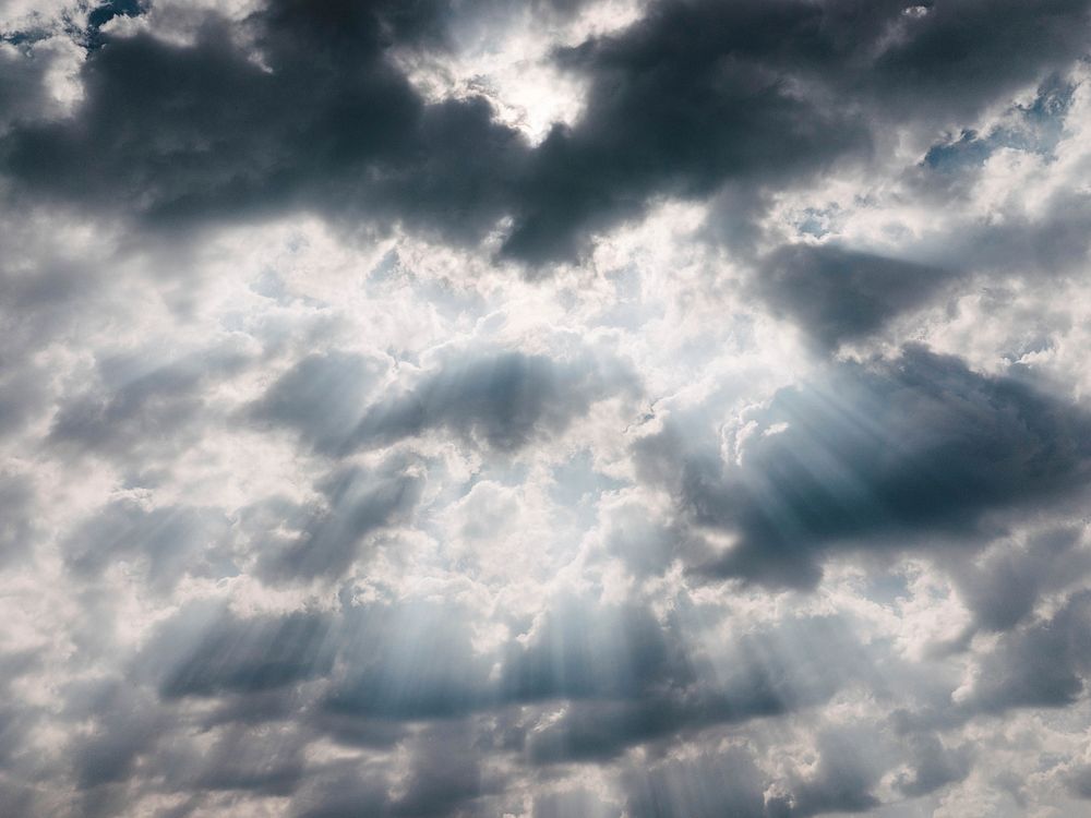 White clouds with sun. Original public domain image from Wikimedia Commons