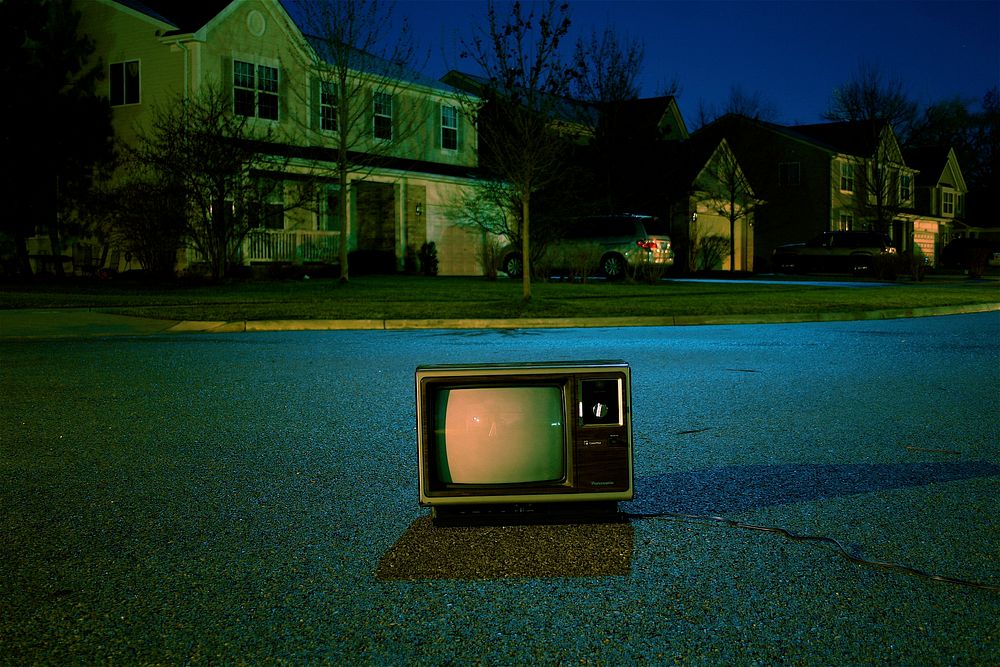 Retro TV on suburban road. Original public domain image from Wikimedia Commons