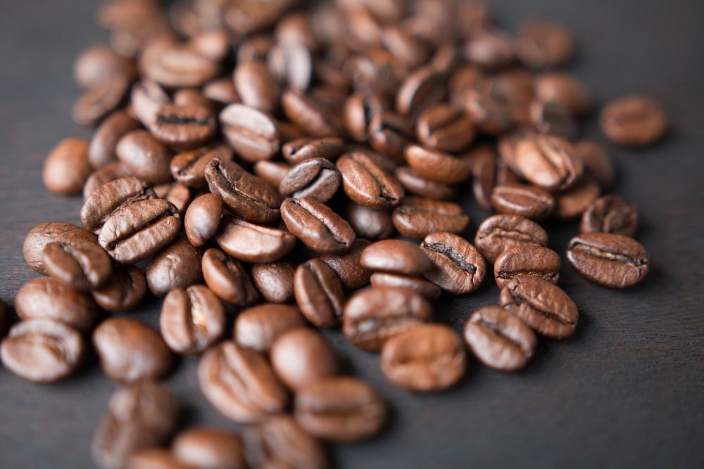 Roasted coffee beans background. Original public domain image from Wikimedia Commons