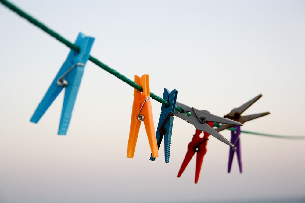 Colored clothespins on a wire in Rota. Original public domain image from Wikimedia Commons