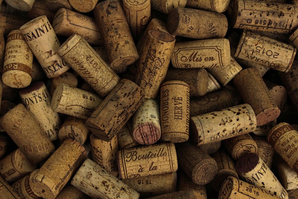 Wine bottle corks. Original public domain image from Wikimedia Commons