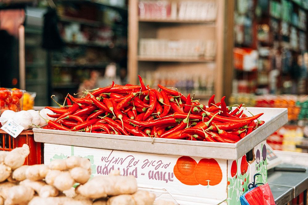 A tray with chili peppers in a store. Original public domain image from Wikimedia Commons