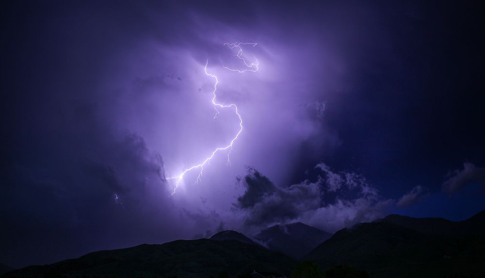 Beautiful purple lightning background. Original public domain image from Wikimedia Commons