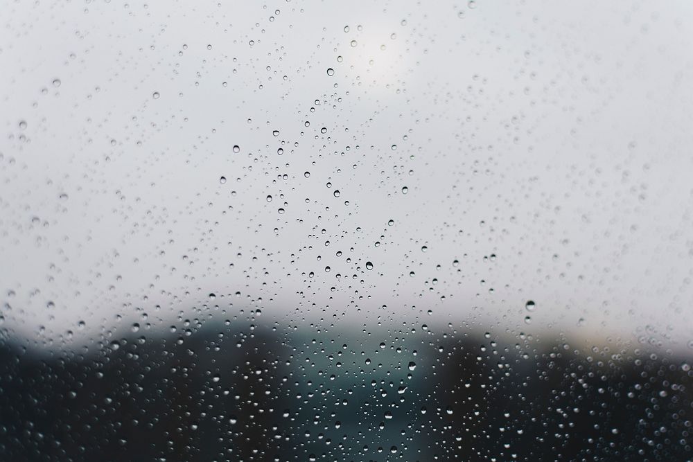 Rain droplets on window background. Original public domain image from Wikimedia Commons