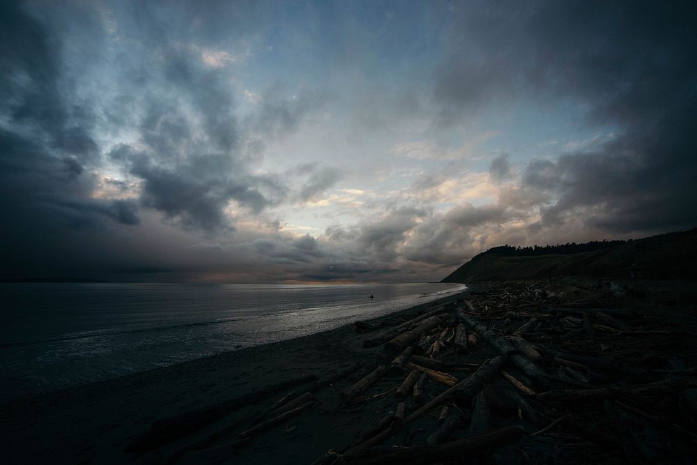 Fort Ebey State Park coastline on a dark cloudy day. Original public domain image from Wikimedia Commons