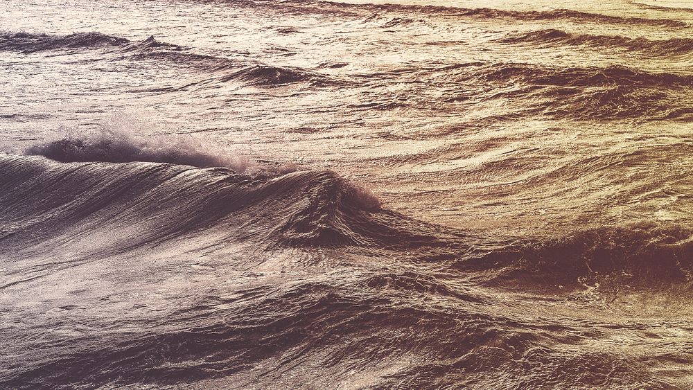 Ocean waves rippling at Glenelg Beach. Original public domain image from Wikimedia Commons