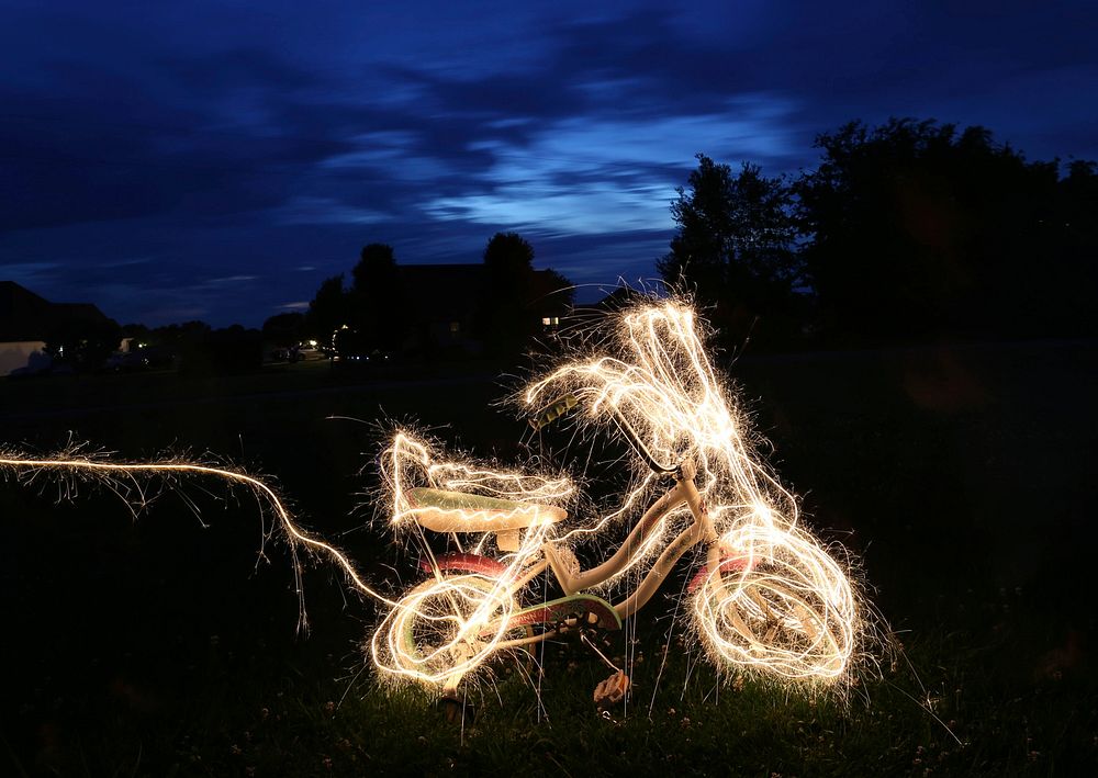 Light Painting with Sparkler and Kids Schwinn. Original public domain image from Wikimedia Commons