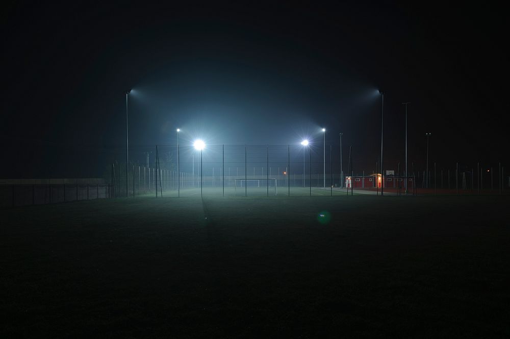 Football field at night. Original public domain image from Wikimedia Commons