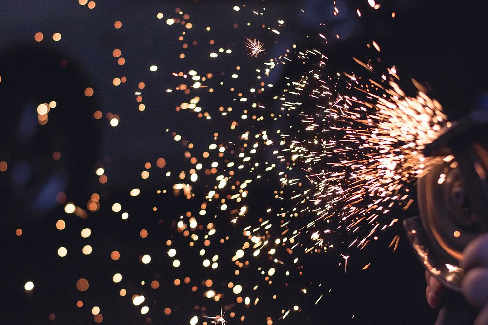Firework sparks background. Original public domain image from Wikimedia Commons