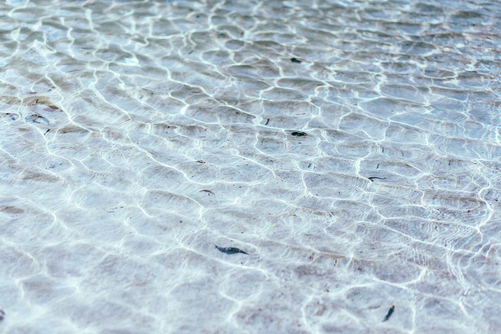 Crystal clear water texture, sea. Original public domain image from Wikimedia Commons
