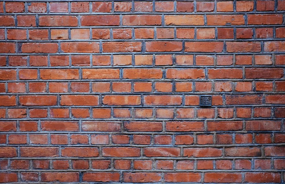 Red brick wall. Original public domain image from Wikimedia Commons