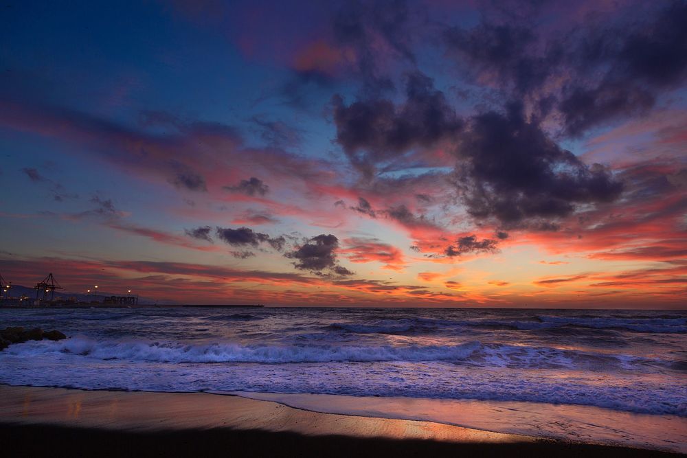 Sunset beach, cloudy, red sky. Original public domain image from Wikimedia Commons
